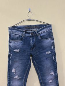 Distressed Denim Jeans
