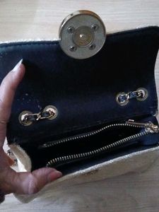 Sparkly sling handbag