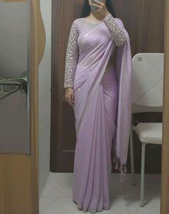 each 700Elegant Pink Embroidered Saree