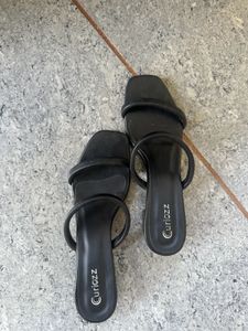 black chappal