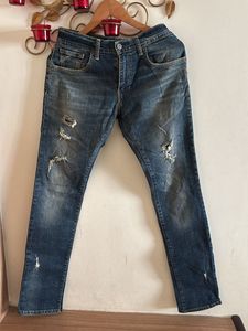 Distressed Denim Jeans
