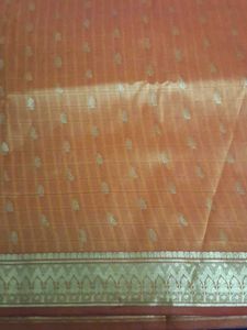 It Is Beautiful Mango Color Silk Saree.