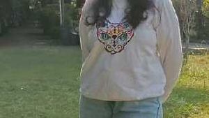 White Sweatshirt with Colorful Cat