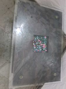 Glass Top Coffee Table with Floral Accent