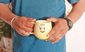 Smiley Coffee/Tea Cup Yellow Color