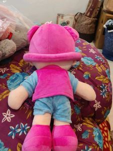 Adorable Plush Doll with Pink Outfit