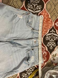 H&amp;M light blue washed ripped shorts