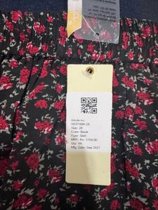 Floral Print Mini Skirt with brand tag