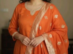Orange Embroidered Kurta Set.   cash only