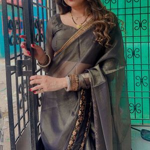 Elegant Bronze Sari with Intricate Gold Border
