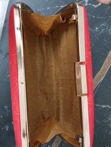 Elegant Red Clutch with Ethnic Design