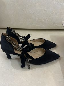 Black Heels with Silver Embellishments