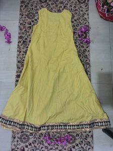 Yellow Sleeveless Dress with Embellished Hem
