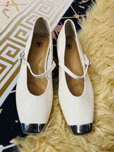 Elegant White Ballerinas