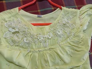 Yellow Dress With Peral Design