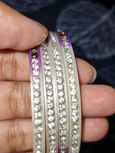 purple and white colour  bangles  with diamonds