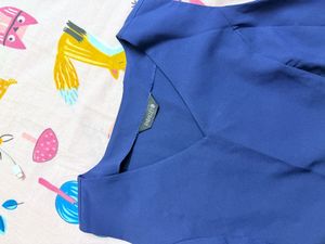 Blue Peplum Sleeveless Top