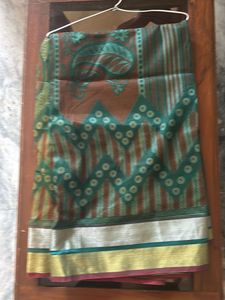 Green Net Saree With Silver And Red Border