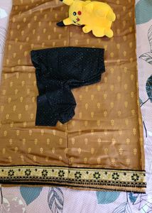 Majestic brown saree with black blouse