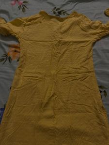 Yellow Kurti with Subtle Detailing