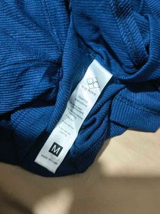 161511. Navy Blue Cutout Long Sleeve Top