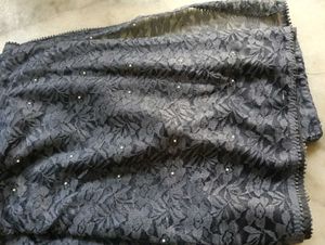 Without Blouse Gray Net Saree With Stones .