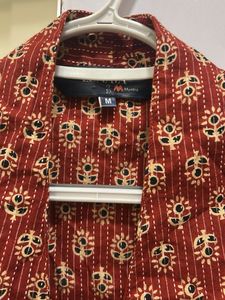 Maroon Sleeveless Button-Down Top