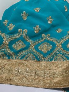 Heavy embroidery sea green saree