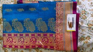 Blue Silk Saree with Peacock Design
