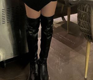 Black above knee boots