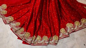 Red. heavy Embroidered. expansive 💯 saree