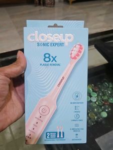 Closeup Sonic Expert Electric Toothbrush