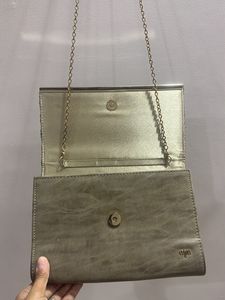Madame Sling Bag