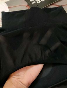 Black mesh back tie crop top