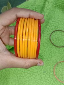 combo of glass and metal bangles