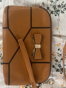 2 in 1, 5 compartment sling bag + pouch