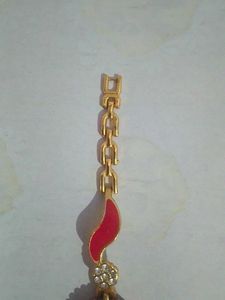 Party Wear Red and Gold Analog Watch