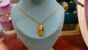 18k- Gold Plated Sun Pendant Necklace.