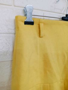 Pleated Yellow Mini Skirt