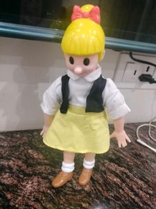 Vintage Blonde Doll with Bow