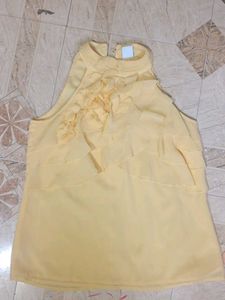 Yellow Sleeveless Ruffle Top