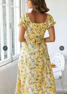 A-Line FloralPrinted Calf Length Yellow dress.