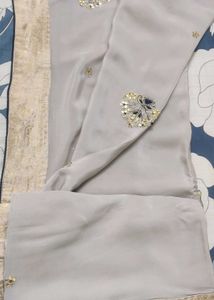 Grey saree with gold border