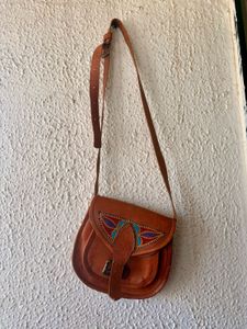 Leather Sling Bag With Hand Work On It