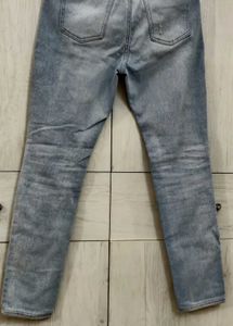 Light Blue Distressed Slim Fit Jeans.