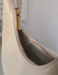 CHARLES &amp; KEITH Cream Philomena Half-Moon Bag