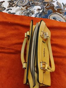 butter yellow handbag