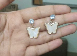 3 jhumka and 2 earrings