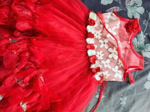 Red Frock With White Detailing