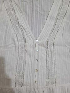 White Sleeveless Top